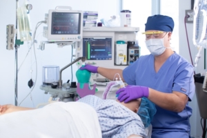 A CRNA with a patient.
