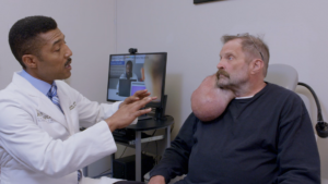 Dr. Osborne with a patient