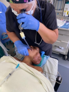 Laurie Hanna, CRNA, in the operating room.