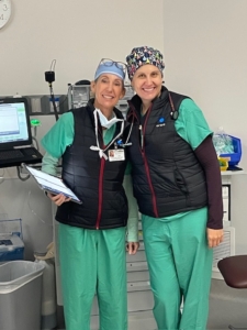 Lisa Solder (left) and Laura Real (right) pose for a photo at their hospital.